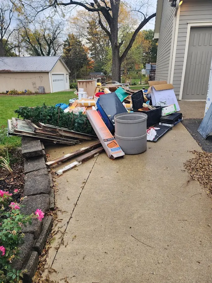 Dumpster being loaded with debris for 30 Yard Dumpster Rental in Middleburg